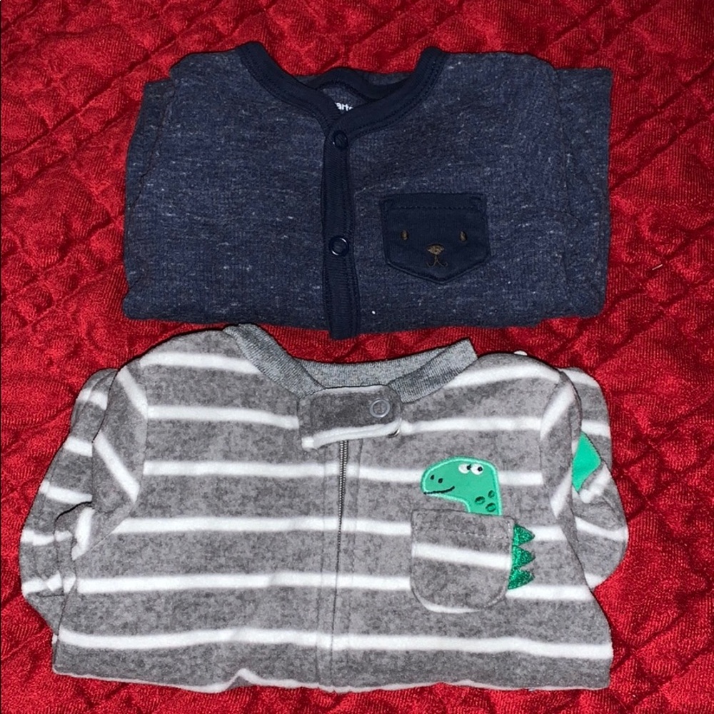 Carter’s size 9 month baby sleepers.
